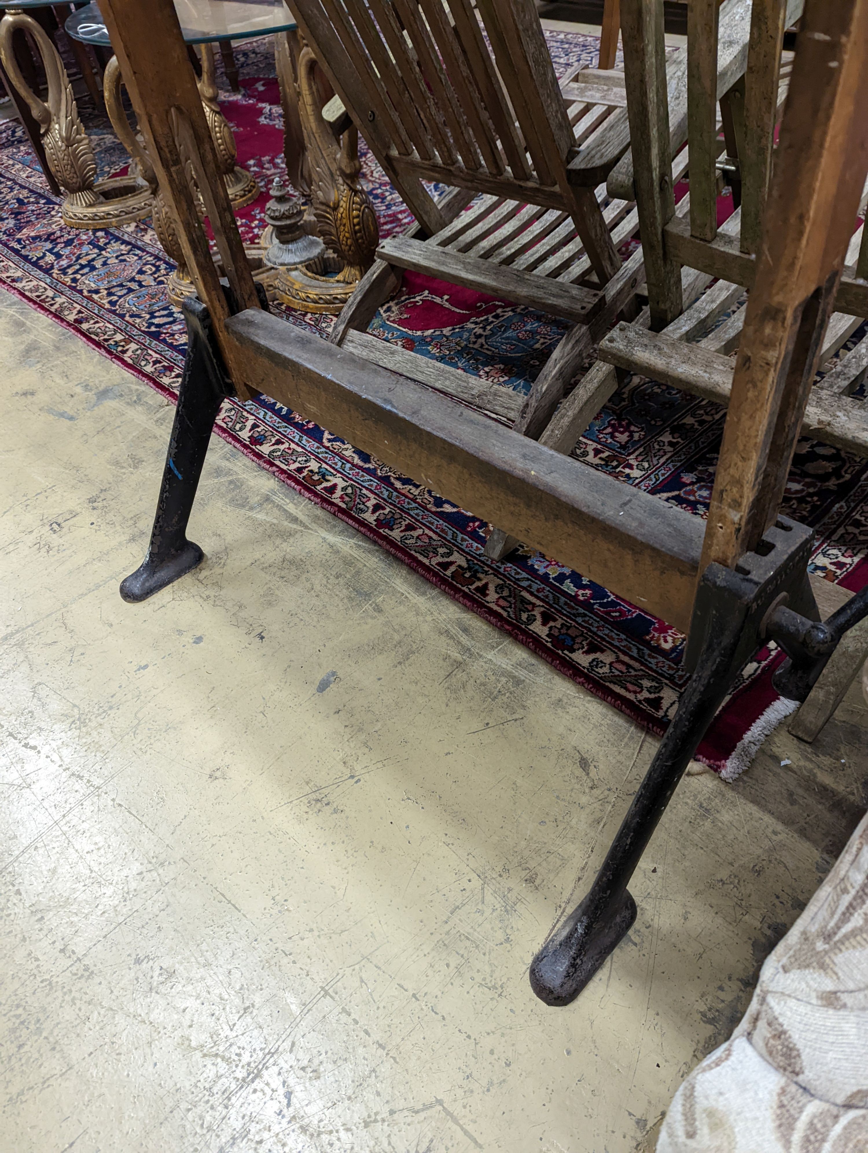A vintage pine and cast iron draughtsman table, by R J Hall and co-Ltd Westminster W-116cm, D-95cm, H-127cm. (Table flat)